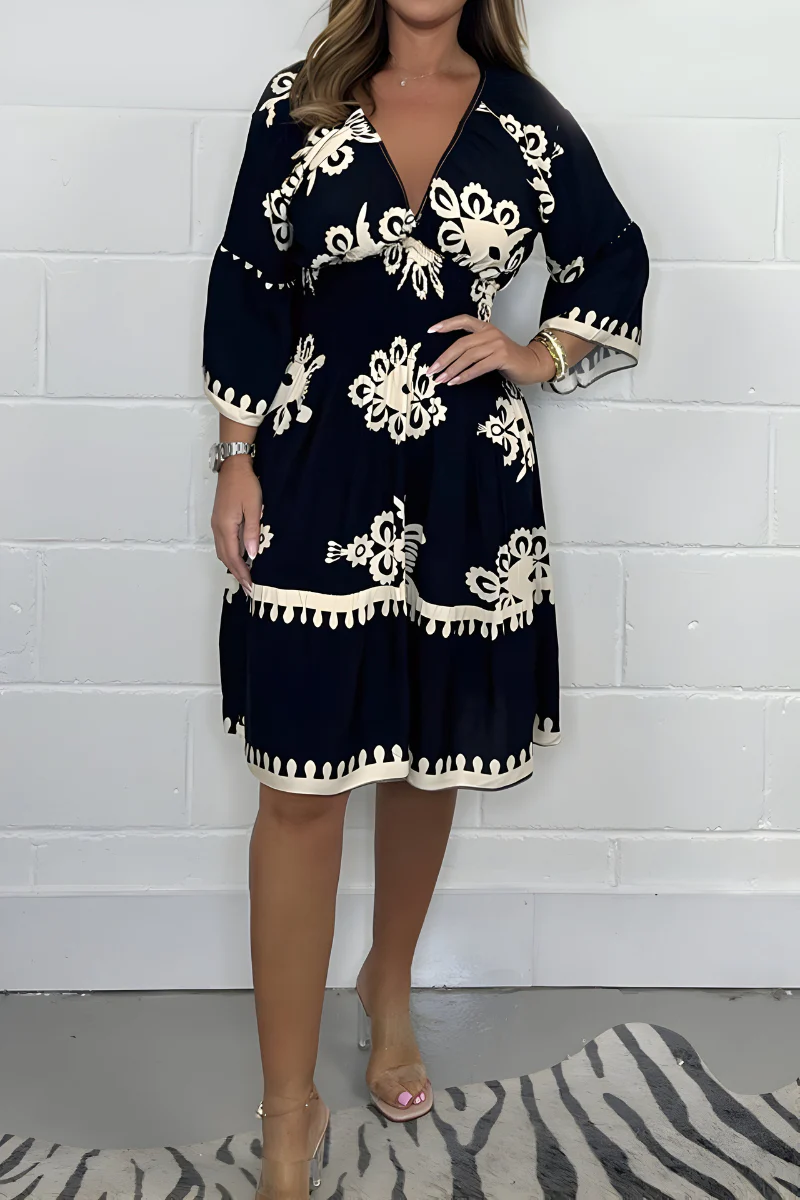 Elegantes Kleid mit Muster und V-Ausschnitt – perfekt für jeden Anlass